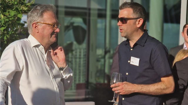 two men talking