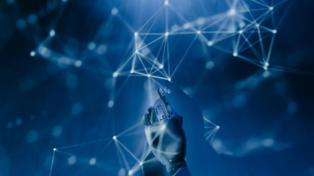 AI stock image with computer hand